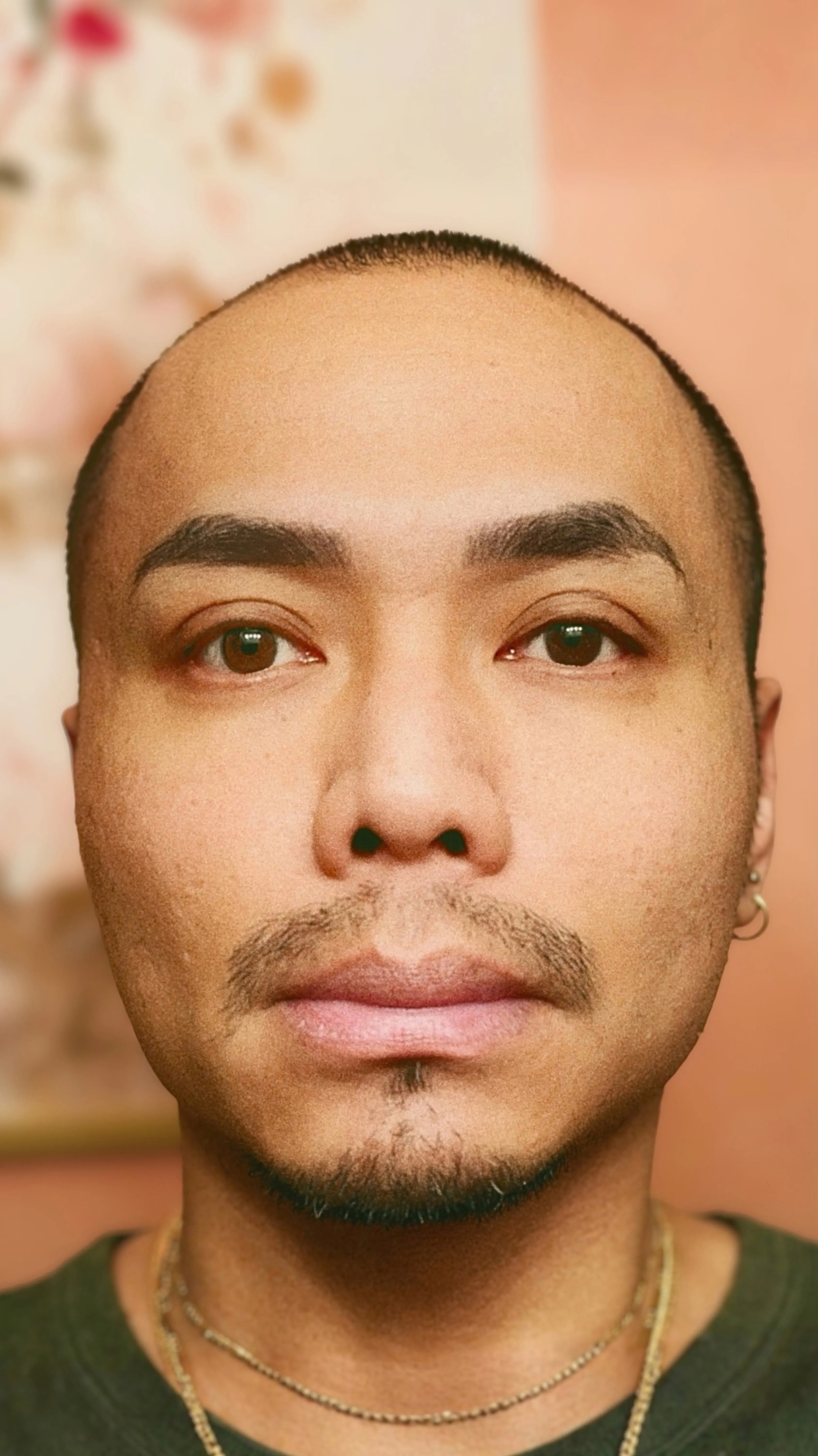 David Chum, a close portrait, looking straight ahead